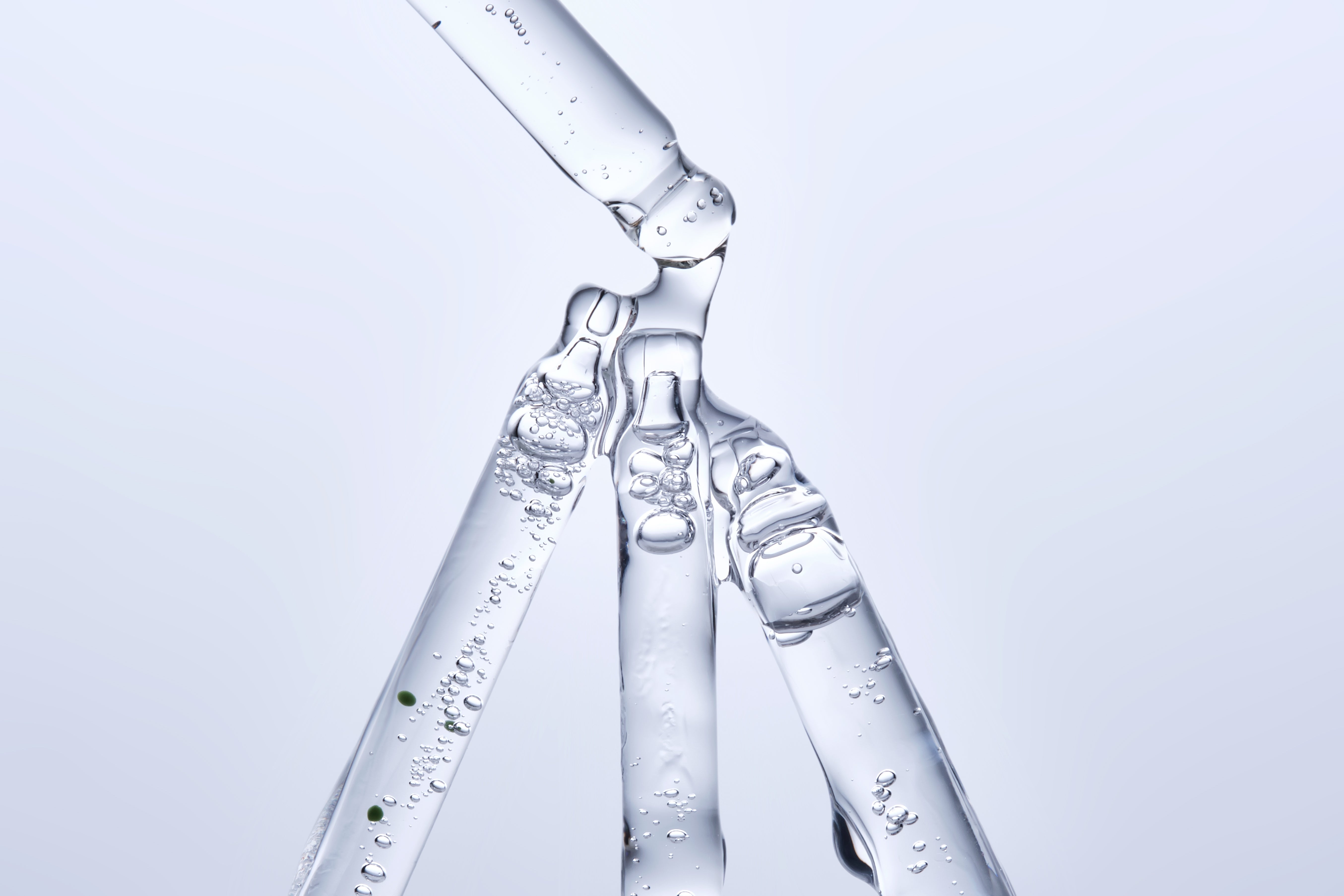 Hyaluronic acid serum on a gray background