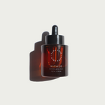 Picture of Sana Haus Vitale facial oil serum in an amber bottle on a light beige background